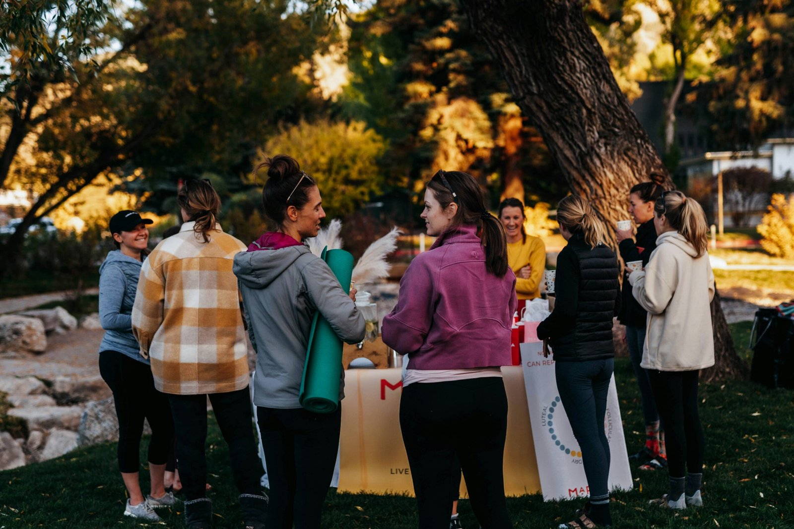 Women's empowerment retreat group gathered outdoors
